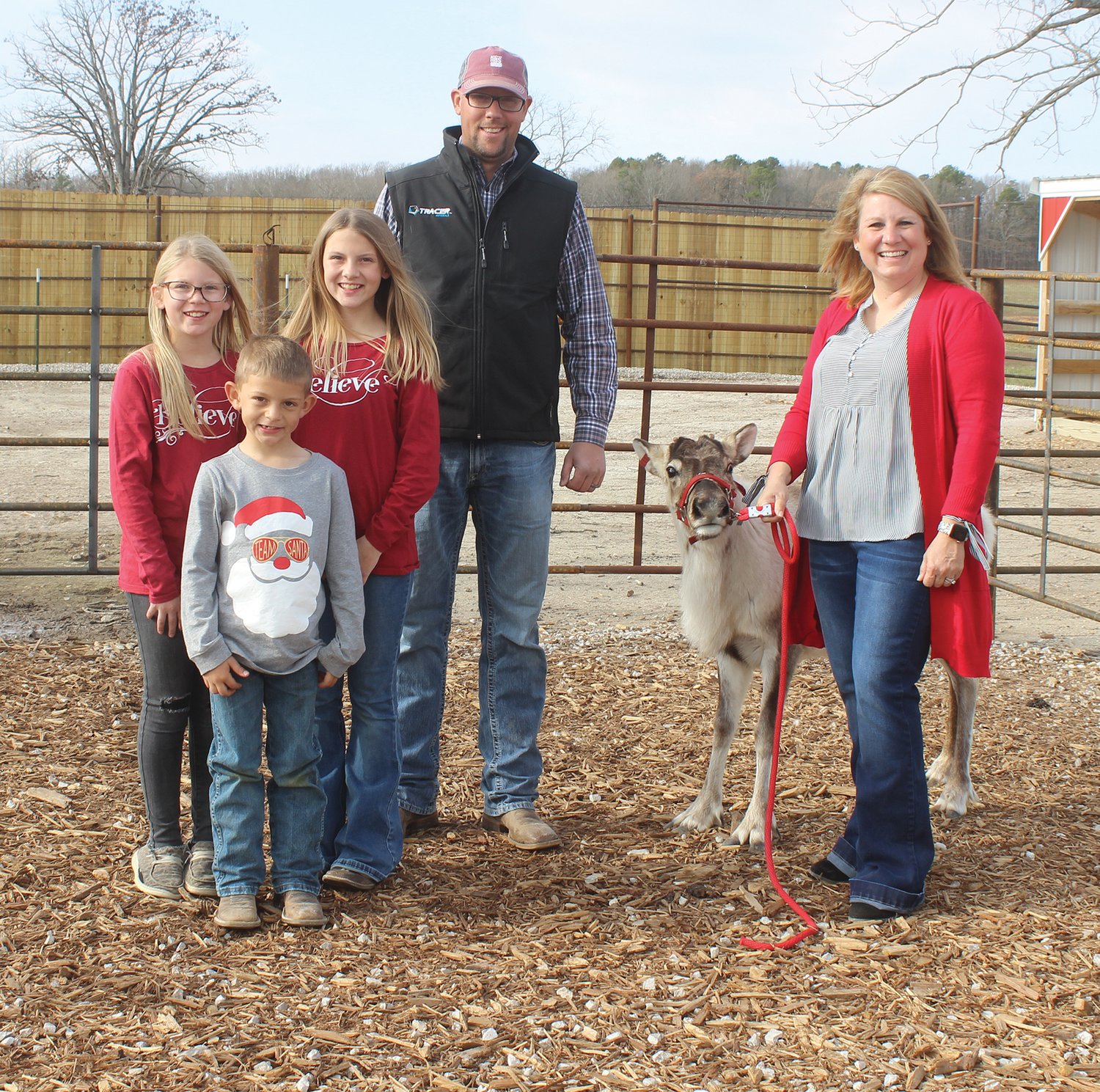“Noel” the reindeer is joined by the Prescott family for a photo at the Holly Jolly Reindeer Ranch. Michael and Sara Prescott are joined by their children Madision, 13; Emma, 10; and Carter, 6.